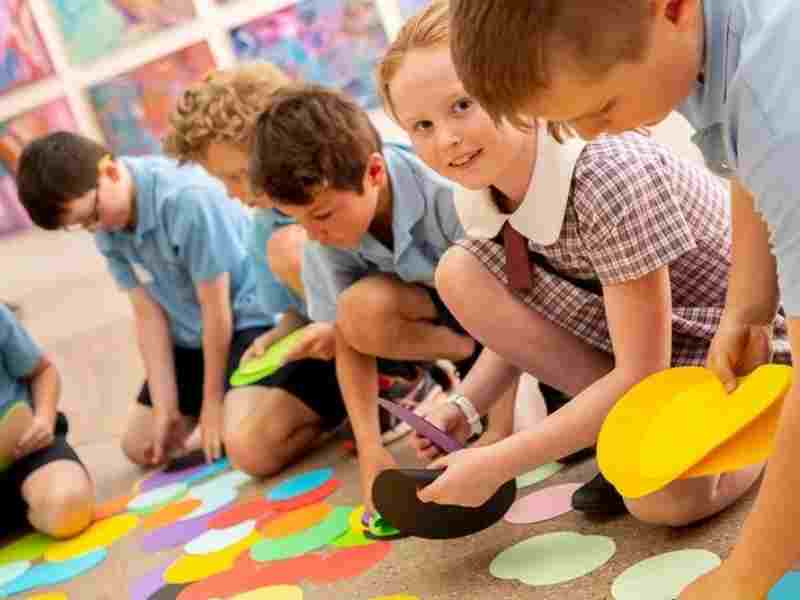Students Writing Reflection Journals During School Excursion