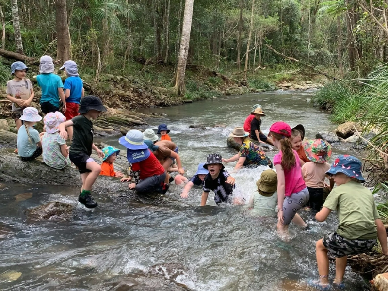 School group enjoying hands-on cultural and wildlife experiences on Gold Coast school excursions