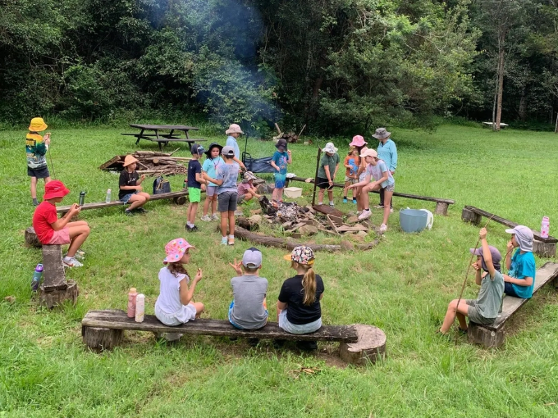 School group enjoying hands-on cultural and wildlife experiences on Gold Coast school excursions